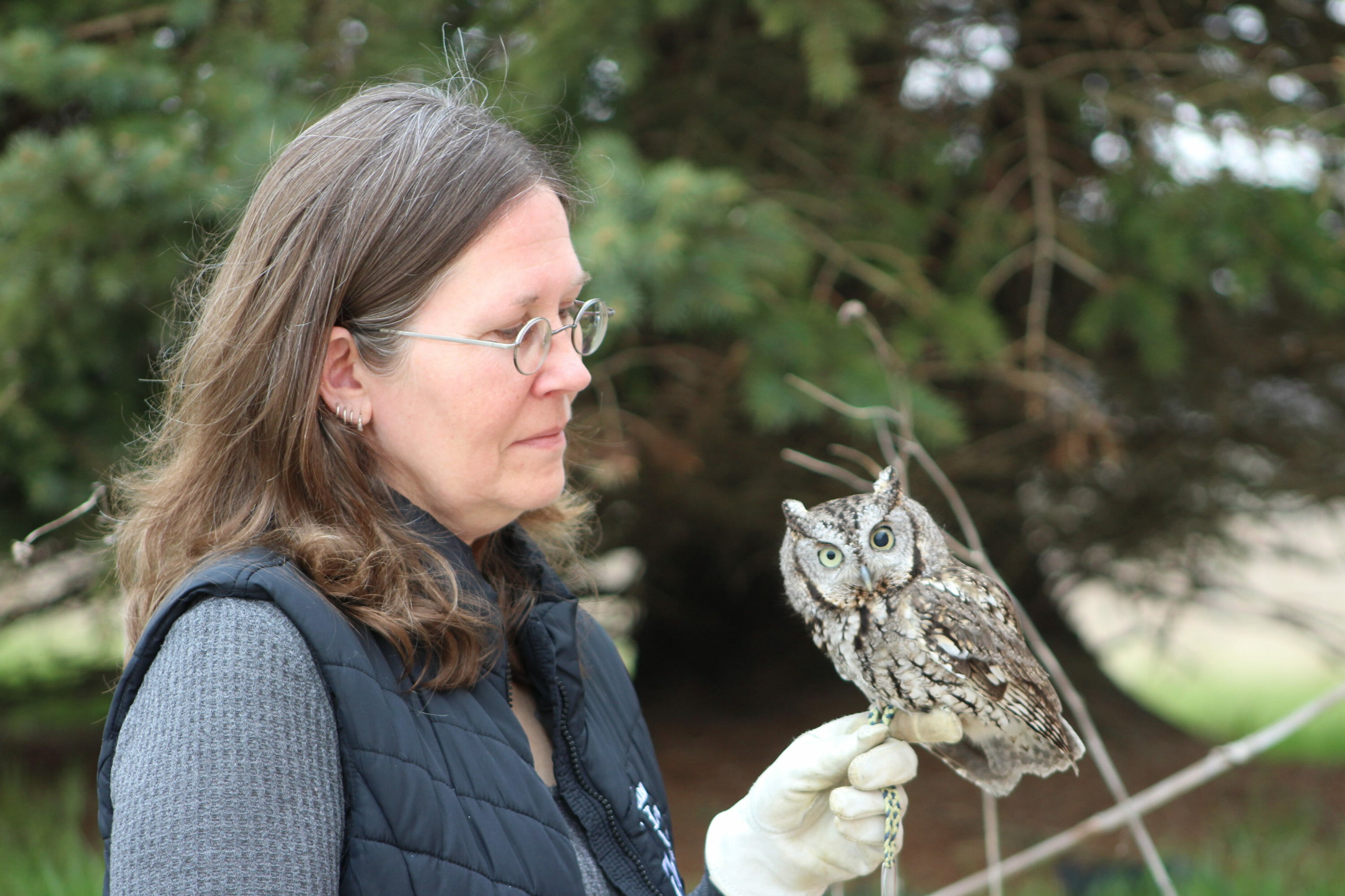 Marsh Haven Instructor with Owl Perched on Hand